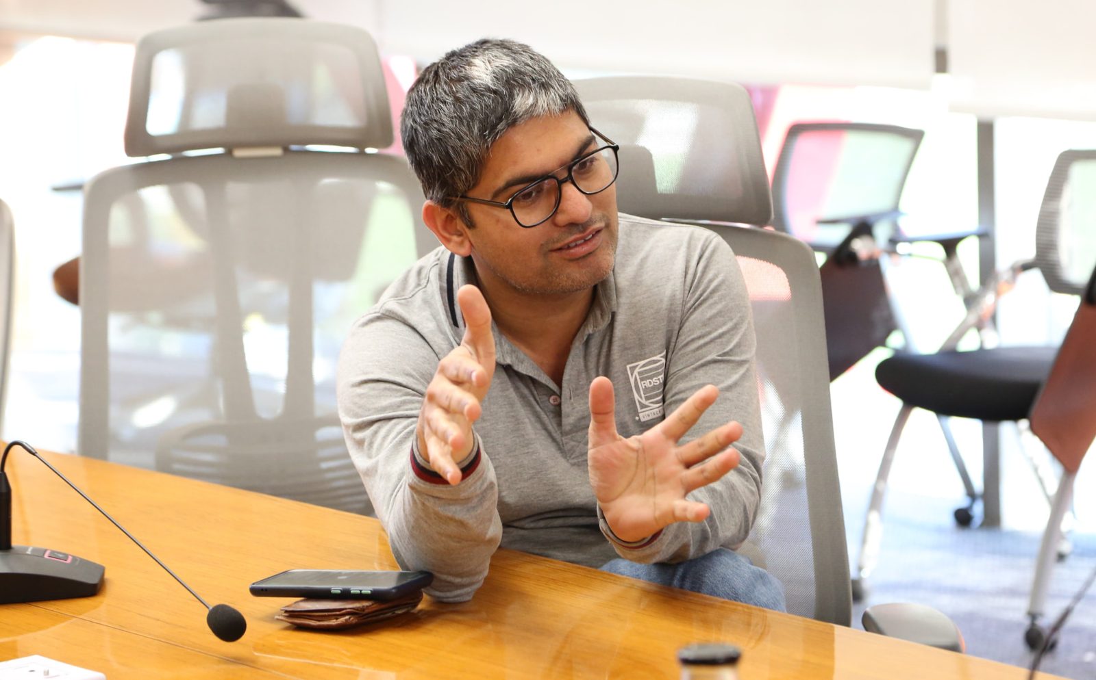 Deepak Maun in a meeting